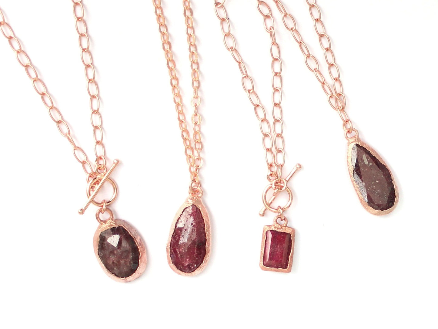 Pear Ruby pendant on long copper chain